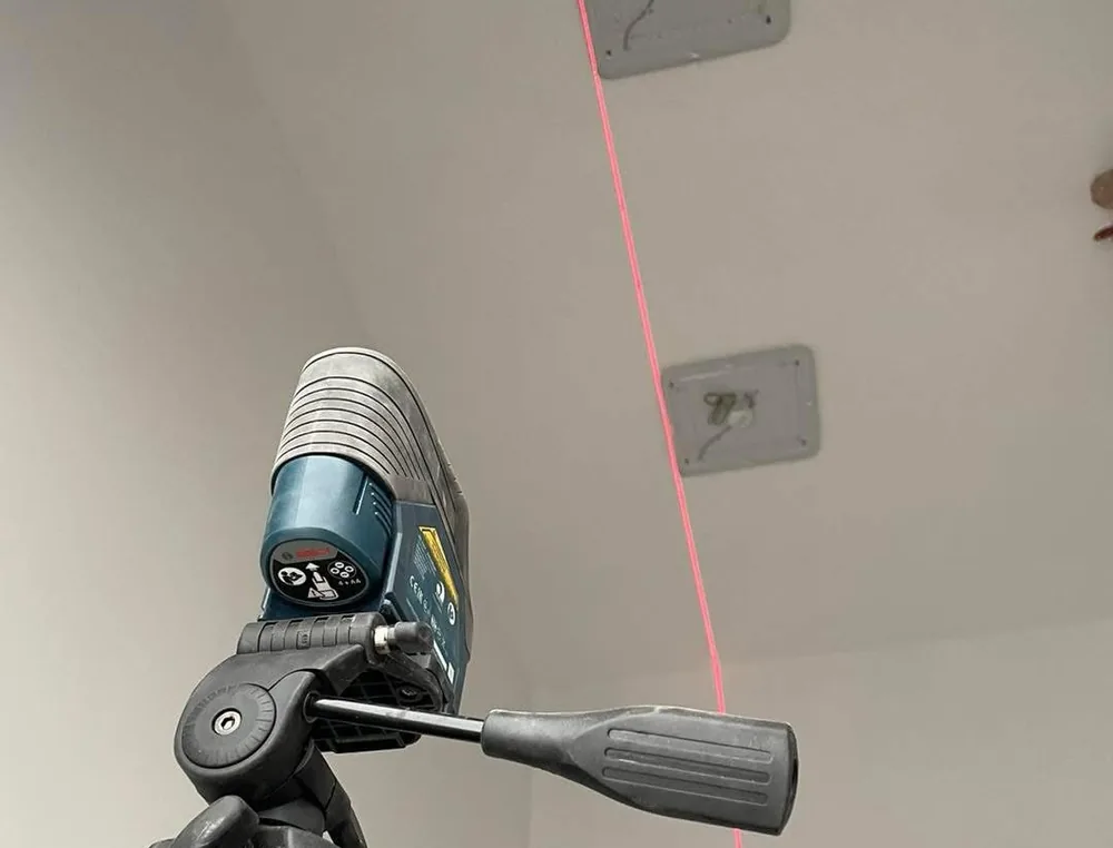 Electrician in Skopje - measuring and setting out with a laser level