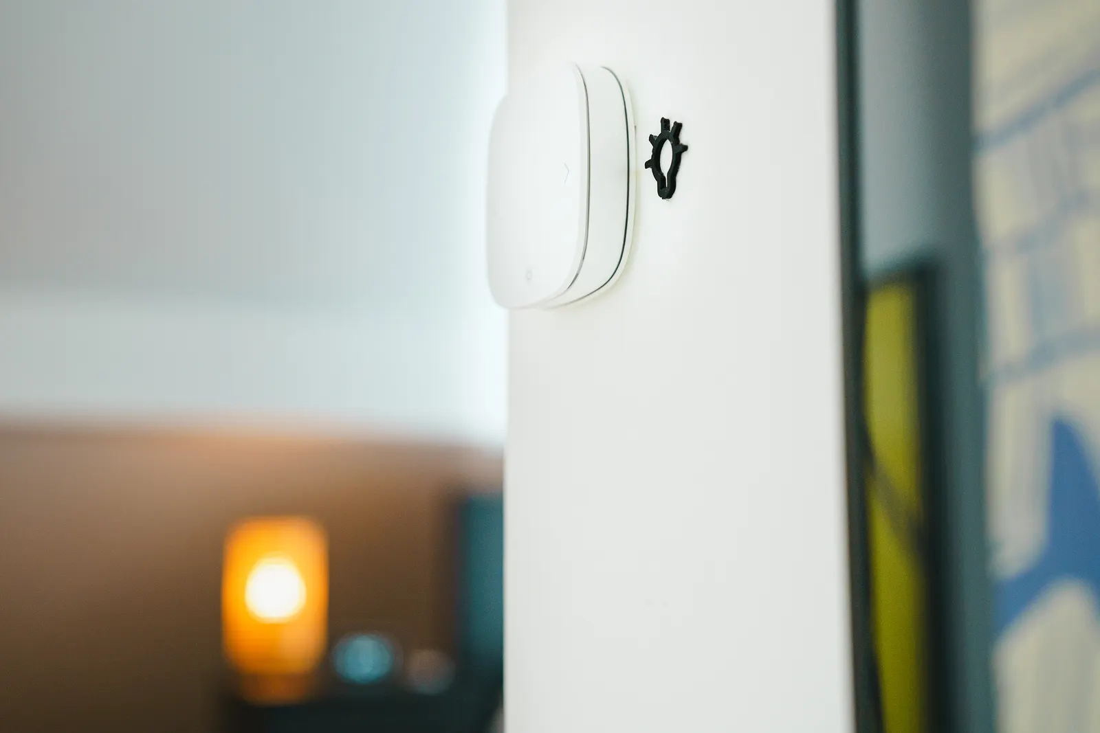 Smart switch mounted on a living room wall